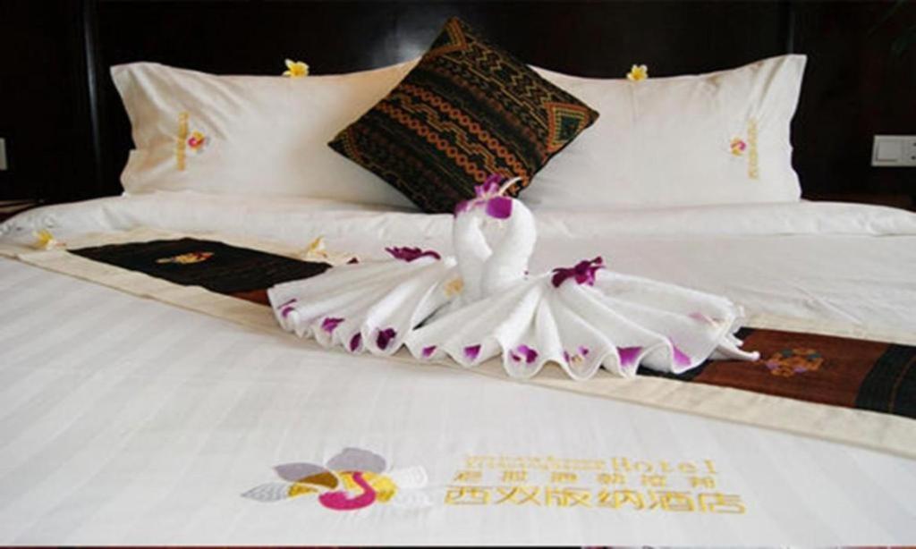 Xishuangbanna Hotel Managed By Xandria Hotel Luang Prabang Exterior photo